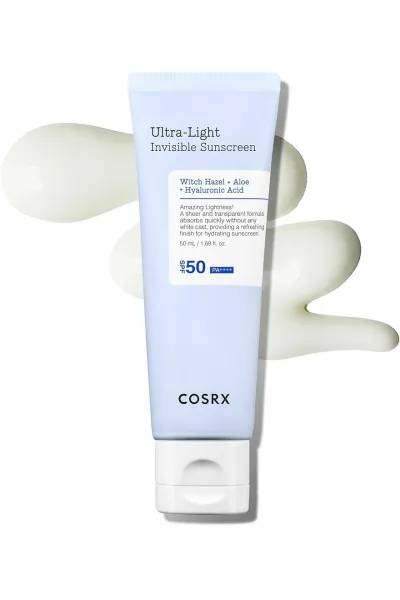 ضد آفتاب شیمیایی با فاکتورهای محافظتی ++++SPF50 PA بسیار سبک و زودجذب مرطوب کننده و تسکین دهنده کنترل ترشح سبوم ایده آل برای استفاده قبل از آرایش فرموله شده با مواد ضد التهاب و تسکین دهنده التیام بخش پوست های تحریک شده مناسب انواع پوست حتی پوست های حساس ت کوزارکس COSRX ضد آفتاب فوق سبک Ultra Light Invisible Sunscreen SPF50
