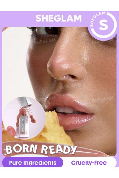درخشندگی کریستالی روی لب رایحه‌ی شیرینی‌های موردعلاقه رنگ نچرال روی لب آبرسانی عمیق لب تسکین لب و… شیگلم SHEGLAM برق لب شیشه‌ای ایر گلاس 011 BORN READY