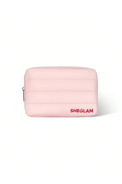 کیف لوازم آرایش صورتی شیگلم مدل Makeup Bag  یک میکاپ بگ زیپ‌دار و کاربردی برای نگهداری مرتب لوازم آرایش روزانه است. طراحی صورتی جذاب  زیپ نایلونی و متریال مقاوم آن  این کیف را به انتخابی مناسب برای استفاده روزمره و همراه داشتن محصولات آرایشی تبدیل می‌کند. شیگلم SHEGLAM کیف آرایشی